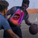 Behind the Haze campaign image featuring two young people playing basketball, one has a lung illustration inset on his chest
